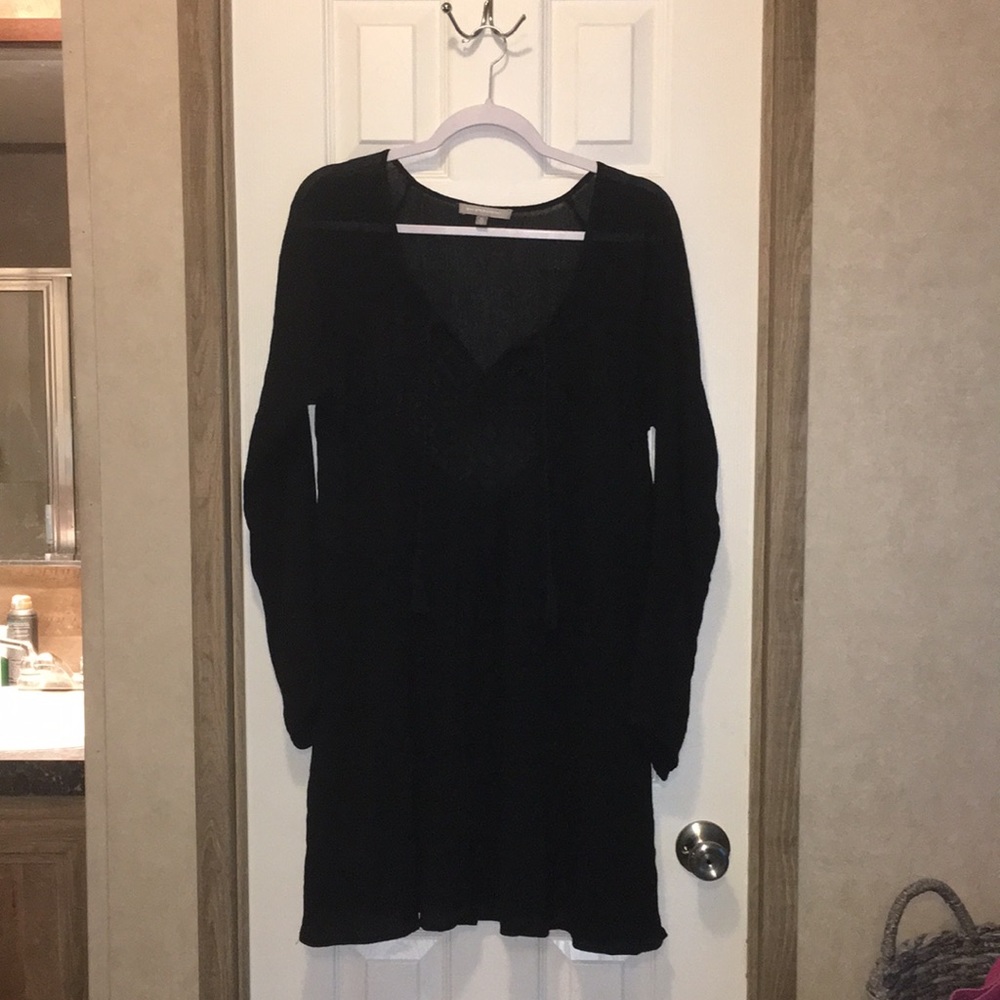 Purple Snow black dress with crochet/lace detail in the front with tie strings.